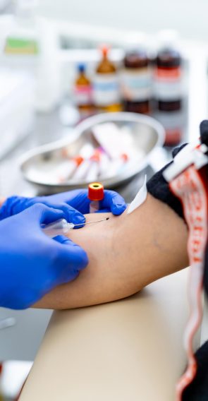 modern-hospital-injection-with-needle-medicine-doctor-hand-blood-taking